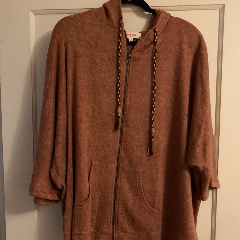 Orange zip up jacket